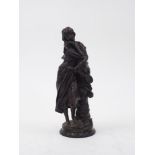 After Adrien-Etienne Gaudez, French, 1845-1902, 'Mignon', a cast bronze figure of a female musician,