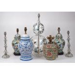 A group of seven table lamps, 20th century, to include a William Yeoward glass table lamp, formed of