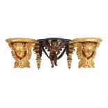 Two pairs of giltwood wall brackets, early 20th century, one pair carved with cherub heads and