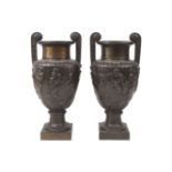 A pair of bronze electroplate twin-handled vases, 20th century, in the manner of the Townley Vase,