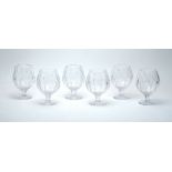 A suite of six cut glass brandy glasses, mid-late 20th century ea., each with acid etched heraldic