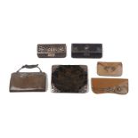 Five silver mounted purses and card cases, including a leather example with pierced silver Art-