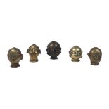 A group of Indian brass heads, 19th century or earlier, Hindu, depicting Gauri, one with remnants of