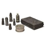 A Tibetan white metal repousse box, a seal paste box, and six white metal seals, 19th-early 20th