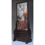 A Chinese hardwood embroidery screen, late 20th century, central panel depicting cherry blossoms,