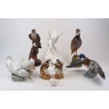A group of bird sculptures, 20th century, to include a pair of Royal Crown Derby Imari style