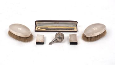 Two silver match box holders, one Birmingham, 1931, James Dixon & Sons, the other London, 1954, with