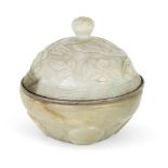 A Chinese celadon green jade bowl and associated cover, 19th century, the cover carved in low relief