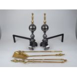 A pair of steel and brass andirons, late 20th century, each with baluster upright and knopped