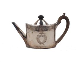 A George III silver teapot, London, 1794, Frances Purton, of oval form with foliate and wheat