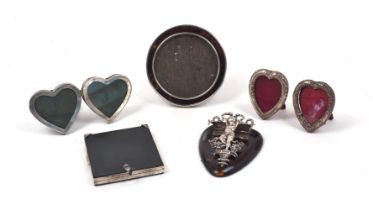 A Victorian tortoiseshell and silver desk top letter/paper clip, London, 1891, maker JB, the heart-