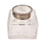An Edwardian silver mounted glass inkwell, Birmingham, 1909, Mappin & Webb, the square cut glass