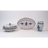 A group of three French blue and white faience table wares, 19th century, to include a a lozenge