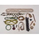 A quantity of costume jewellery, 20th century/modern, to include: rosaries, hardstone beads,