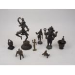 A group of bronze figures, 19th century and later, to include; a sculpture of Ganesha, 22.5cm
