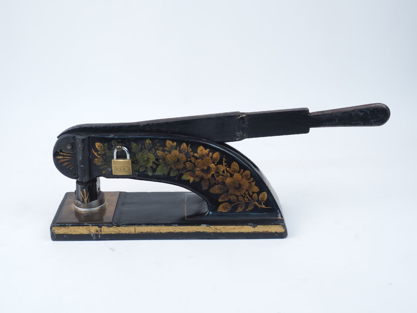 A Victorian embossing press for company seals, late 19th century, cast iron with japanned decoration