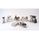 A group of ceramic animals, 20th century, to include two Royal Copenhagen puppies, no. 444 & 564,