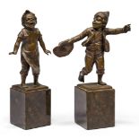 After Paul Ludwig Kowalczewski, German, 1865-1910, a pair of bronze figures of boys, early 20th