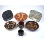 A quantity of slipware and other ceramics, late 19th/20th century, to include; an 18th century-style