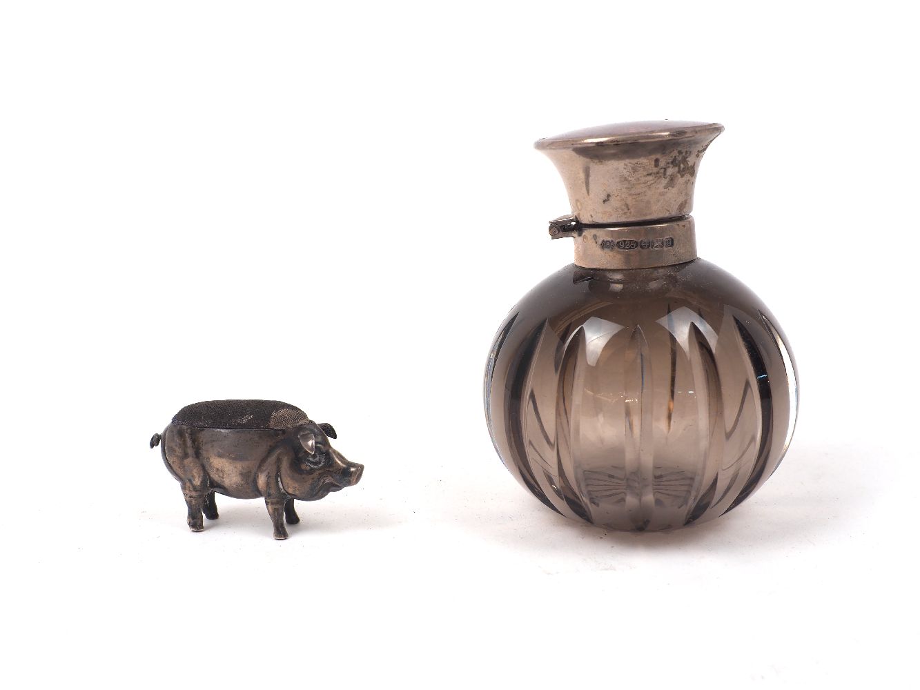 An Edwardian novelty silver pig pin cushion, Chester, 1908, Adie & Lovekin, realistically modelled