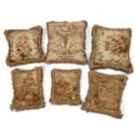 Six French Aubusson tapestry cushions , 19th century, comprising: two with figures in a landscape,