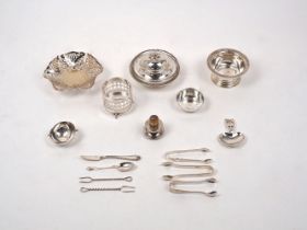 A small group of silver comprising: a Garrard & Co. Art Nouveau- style caddy spoon, Birmingham,