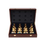 A Dorin D'Or perfume collection set, consisting of twelve different scents, in 18ml gilt bottles, in