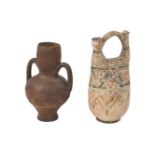 Two earthenware vessels, Islamic, 19th to 20th century, one with remnants of coloured slip design,