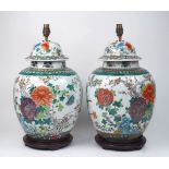 A pair of Chinese vase lamps, 20th century, each with domed cover, decorated with chrysanthemum