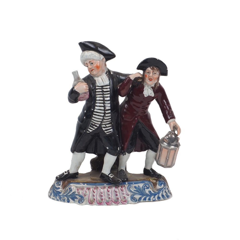 A pearlware Staffordshire figure group, 'The Parson and His Clerk', early 19th Century, of typical