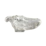 A carved rock crystal cup, second half 20th century, of oval form with a scrolling wave design, 13cm