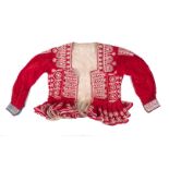 A Peruvian red velvet jacket with floral beadwork decoration, 20th century Please refer to