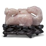 A large Chinese carved rose quartz celestial rams group, 18th/19th century, each carved in recumbent