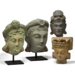 Four South East Asian carved marble and stone busts of female deities, 20th century, three on modern