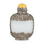 A Chinese white metal encased glass snuff bottle, early 20th century, the white metal case