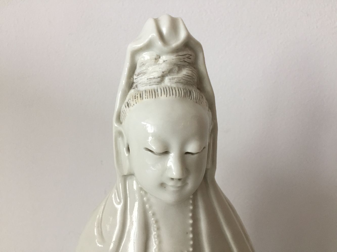 A Chinese Dehua porcelain figure of Guanyin, 19th century, modelled standing with long flowing - Image 9 of 11