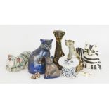 A group of British studio pottery cats, to include; a salt glazed stoneware cat by Mary Rich (