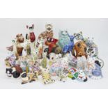 A collection of pottery cats, in a variety of colourful glazes, to include; a Rye pottery cat, of