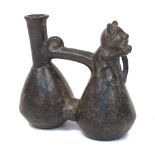 After the Antique, a Pre-Columbian style Chimu double gourd vessel, with stylised cat to front, 14cm