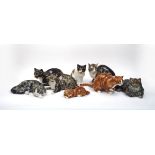 A collection of Mike Hinton pottery cats, to include two ginger cats, largest 17cm high, two