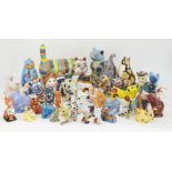 A group of pottery cats with vibrant glazes, to include; AHS pottery cat, a Sergey Gerasimenko