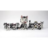 A quantity of Bailey pottery cats, 20th century and later, in black and white glaze colour way, to
