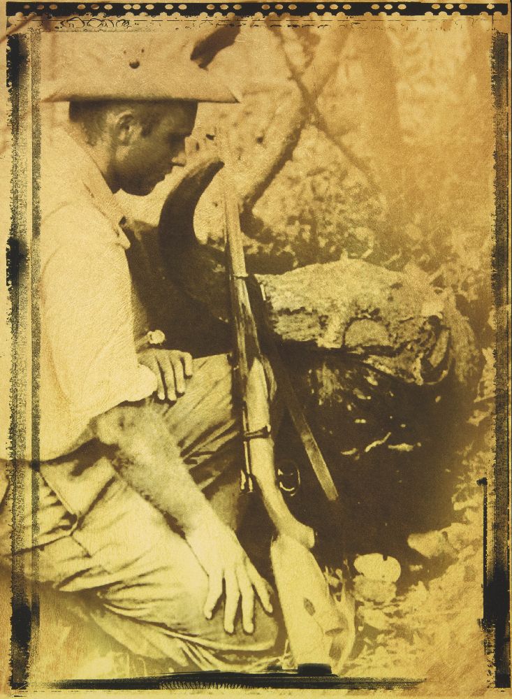 Four sepia-toned reproduction prints of vintage photographs depicting big game hunters, 28 x 20. - Bild 5 aus 6