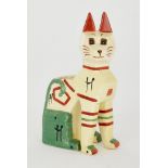 A Louis Wain Egyptian cat spill vase, painted in shades of yellow, red and green highlighted with