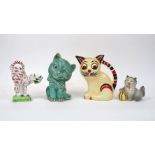 A group of pottery cats, early to mid 20th century, to include a Shorter porcelain figure of a cat