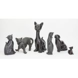 A collection of black glazed pottery cats, largest 30.5cm high, smallest 7.5cm (6)Please refer to