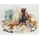 A collection of pottery cats, to include; a porcelain Royal Worcester Flat Mates 'Topsy' cat, a