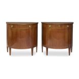 A pair of George III style mahogany demi-lune side cabinets, of recent manufacture, in the manner of