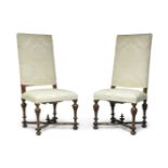 A pair of Italian walnut high backed chairs, probably Ligurian, 18th Century, 120cm high (2)