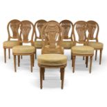 A set of eight French style dining chairs, 20th century, with shaped and pierced back splats, sprung